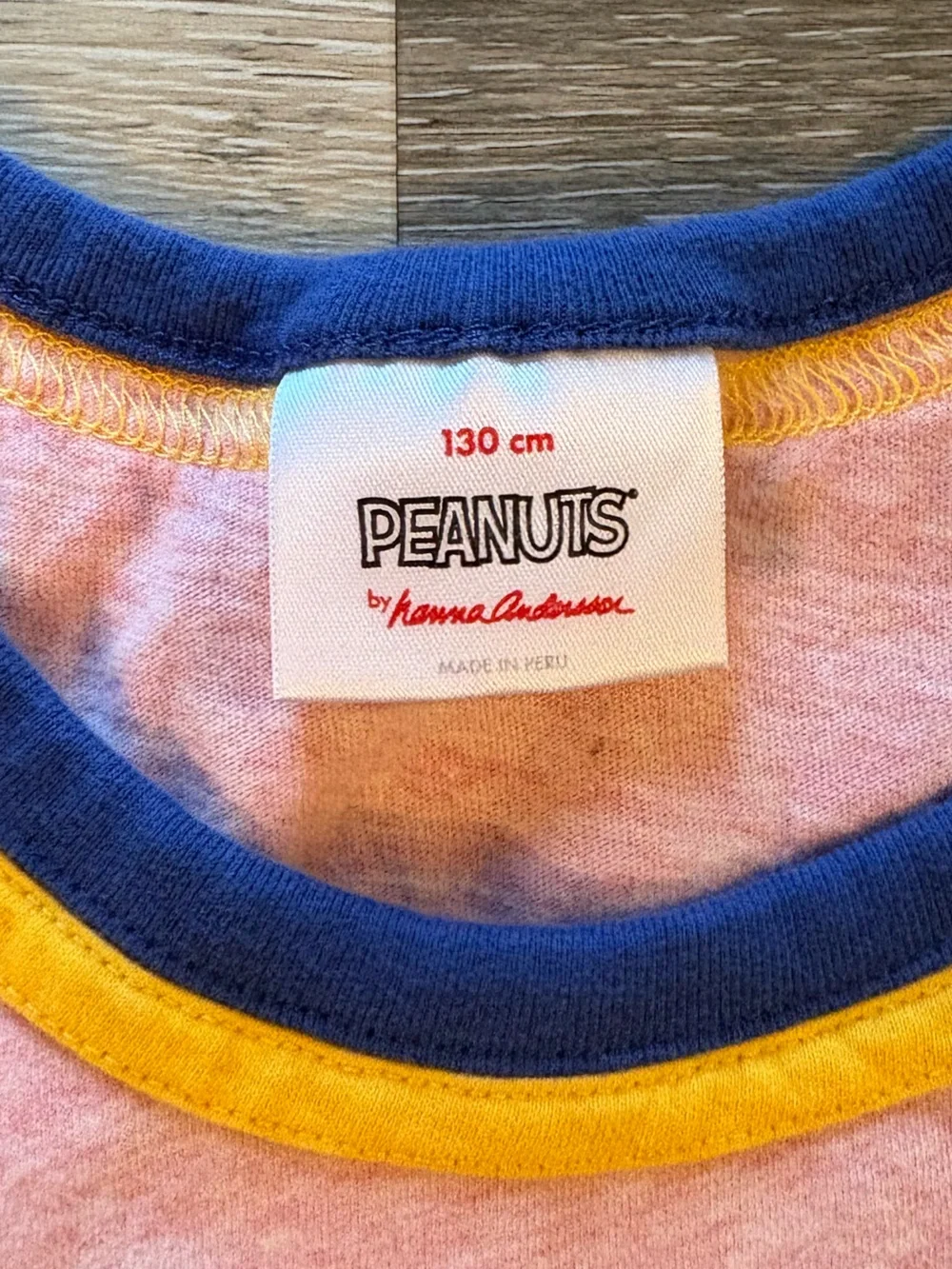 Hanna Andersson Pink Tank with Navy & Yellow Trim Peanuts Graphic